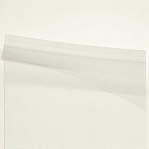 Commercial window tinting installation with professional technician applying film