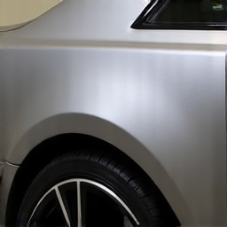 XPEL Stealth Matte Paint Protection Film applied to a luxury SUV. The film gives a satin, matte finish to the dark vehicle, offering a unique aesthetic while providing durable paint protection against chips and scratches.